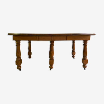 Solid oak dining table with extension cords