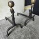 Pair of fire dogs - wrought iron and brass