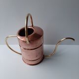 Ancient copper watering can
