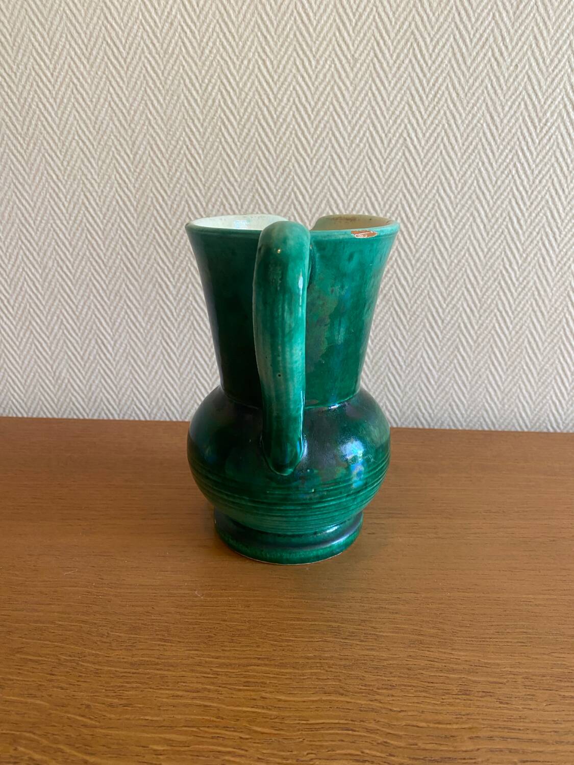 Green glazed ceramic carafe