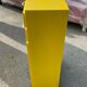 Yellow wooden chest of drawers