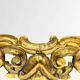 Antique wall mirror in carved and gilded wood, baroque style, 140 × 115 cm