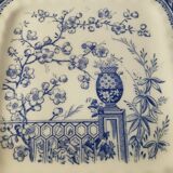 Plate with phosphatic porcelain decoration