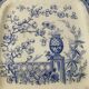 Plate with phosphatic porcelain decoration