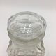 Duo of chiseled glass jars