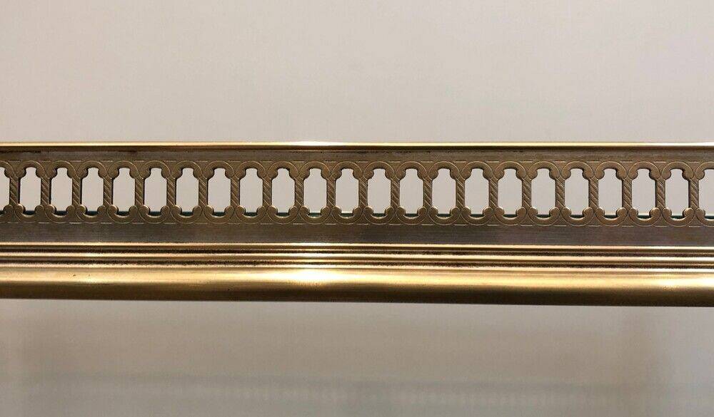 Neoclassical style rolling table in silvered brass