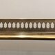 Neoclassical style rolling table in silvered brass