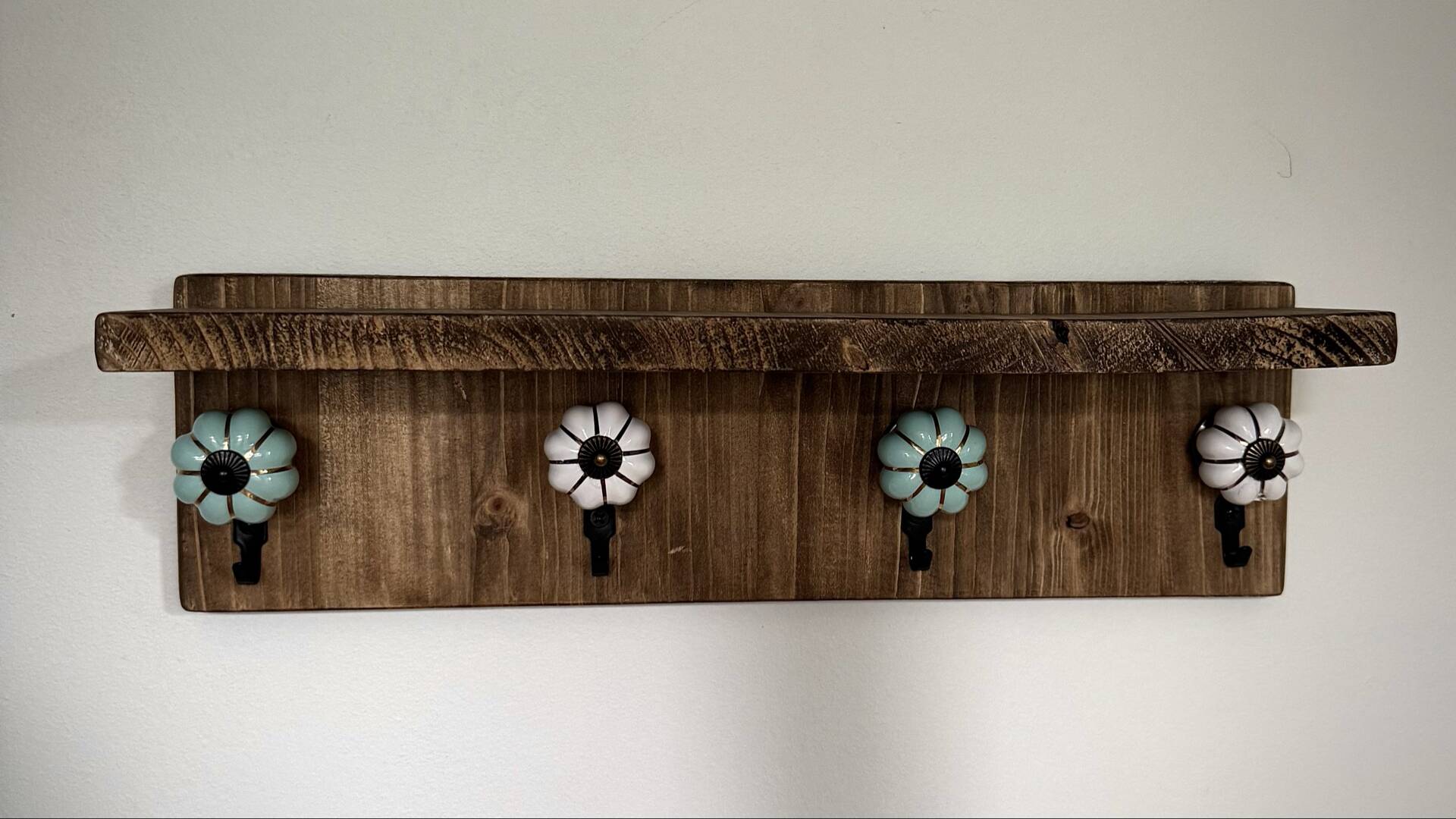 Wooden key holder shelf with hooks and ceramic knobs
