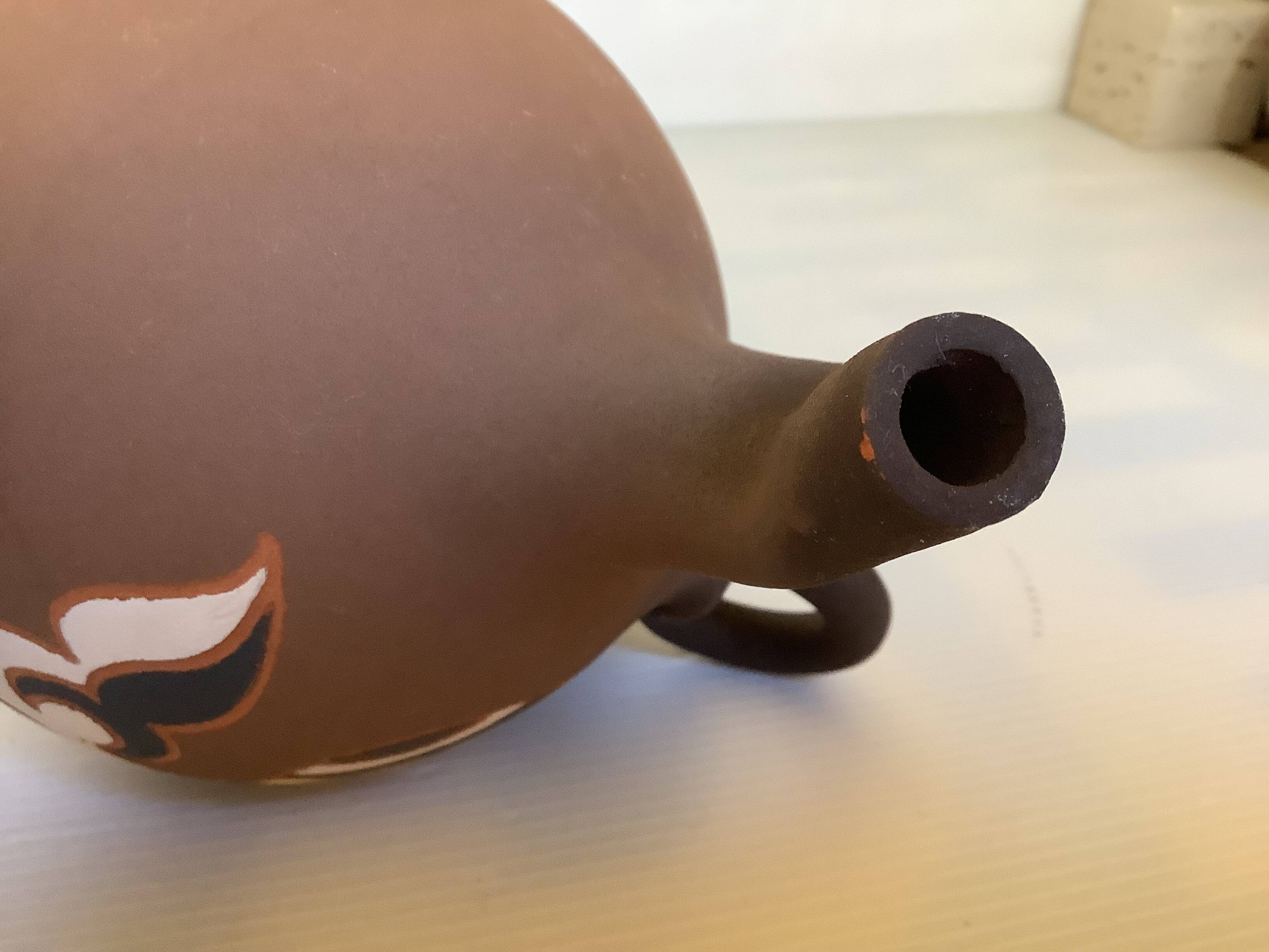 Signed terracotta vase