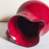 Vintage red enamel ceramic pitcher