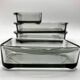 Teak tray and its 4 stackable glass dishes • Denmark • 1960