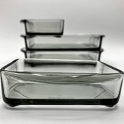 Teak tray and its 4 stackable glass dishes • Denmark • 1960