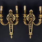 Large pair of gilt bronze wall sconces in the Louis XVI style.
