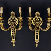 Large pair of gilt bronze wall sconces in the Louis XVI style.
