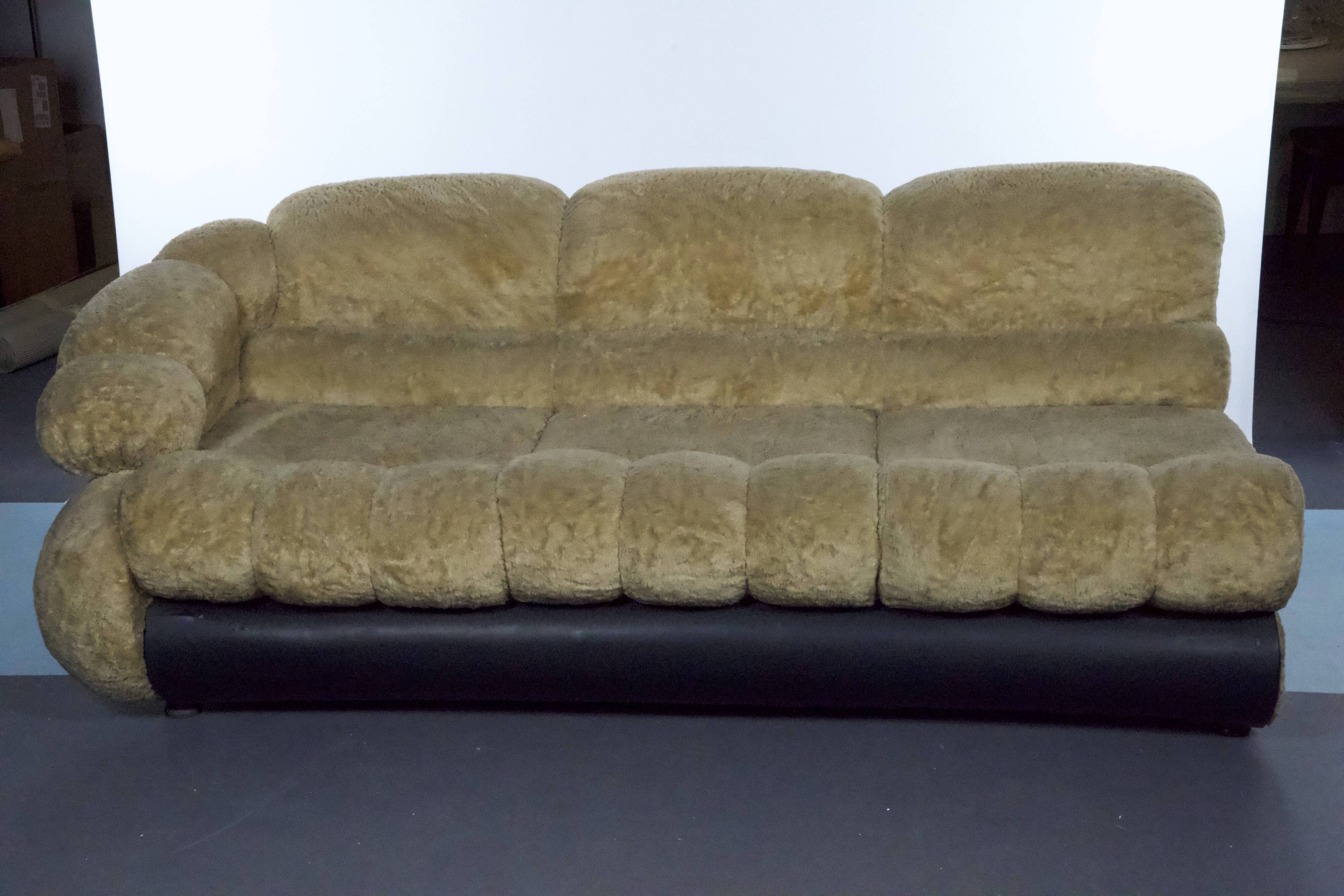 three-seater sofa designed by Adriano Piazzesi, produced in Italy during the 1970s. Upholster