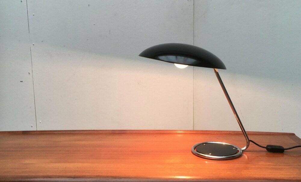 Metal table lamp model 6761 from the mid-century German period by Christian Dell for Kaiser Leuchten, 1960s.