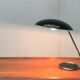 Metal table lamp model 6761 from the mid-century German period by Christian Dell for Kaiser Leuchten, 1960s.