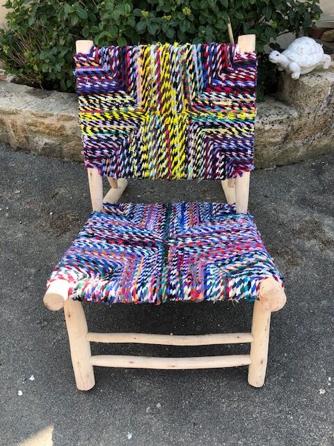 Wooden armchair braiding multicolored fabrics
