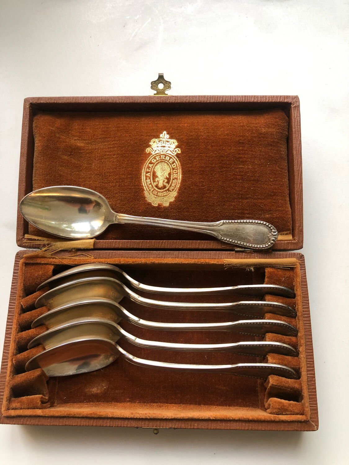 6 small silver metal spoons