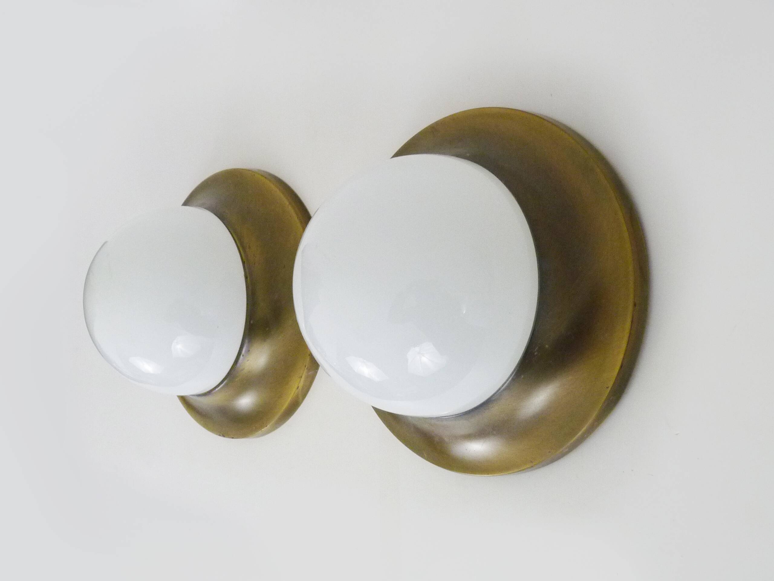Pair of Space age wall lights made in Austria, Opaline gold metal. UFO