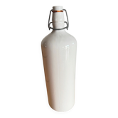 Old white ceramic bottle