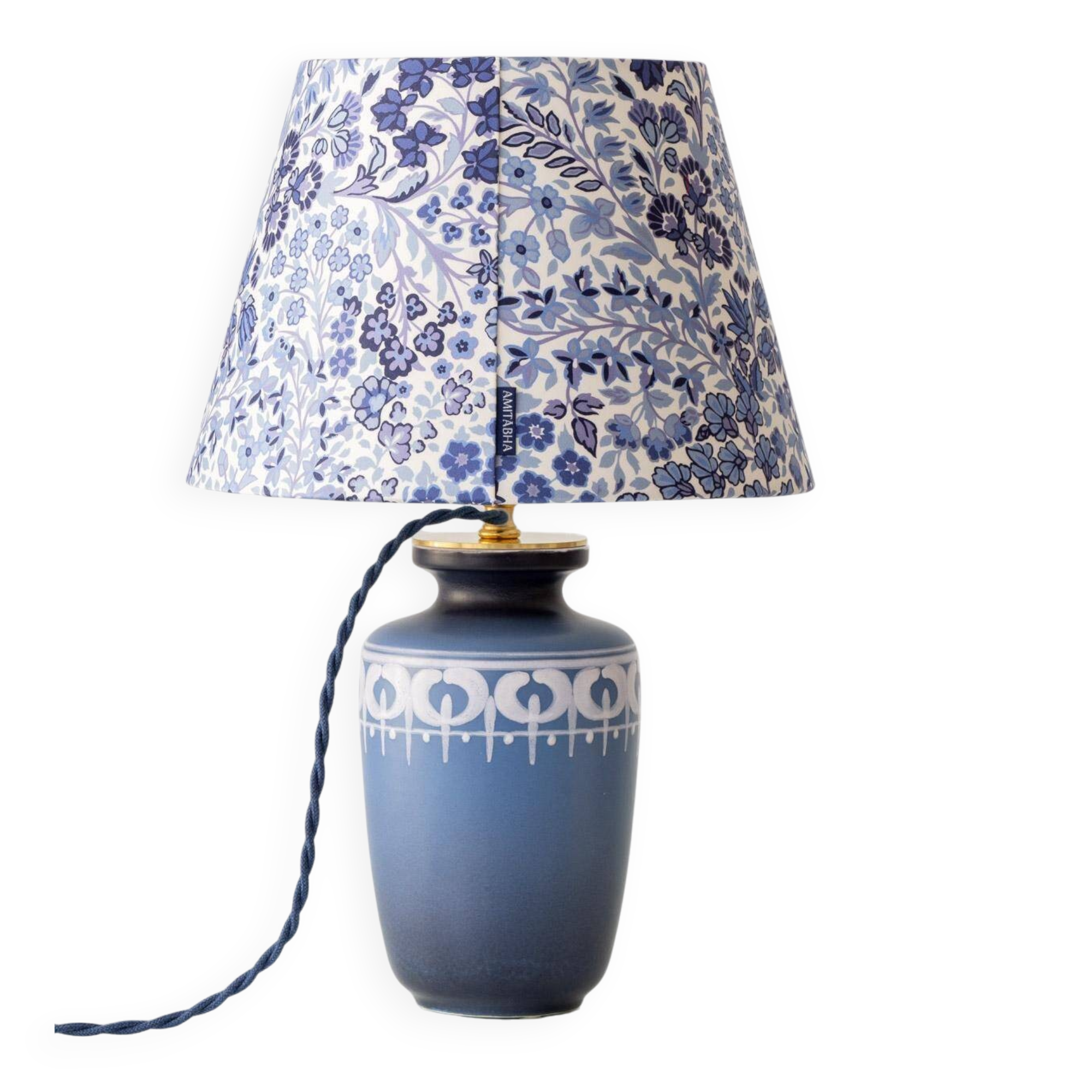 Mid-century modern blue ceramic table lamp with new Liberty London floral shade.