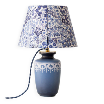 Mid-century modern blue ceramic table lamp with new Liberty London floral shade.