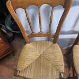 4 rustic farmhouse chairs made of wood and straw