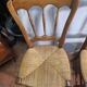 4 rustic farmhouse chairs made of wood and straw