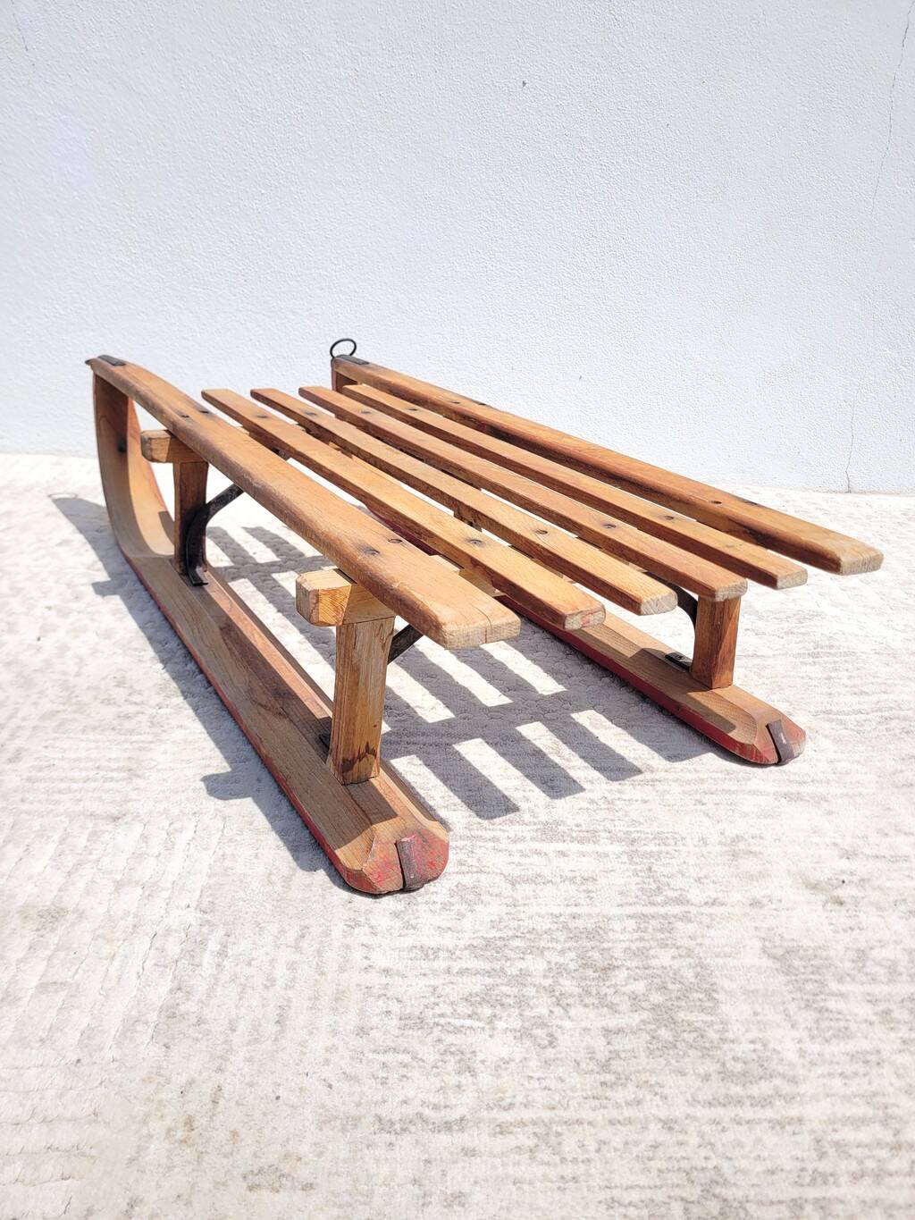Antique wooden sled with metal runners