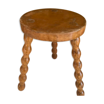 Wooden tripod farm stool