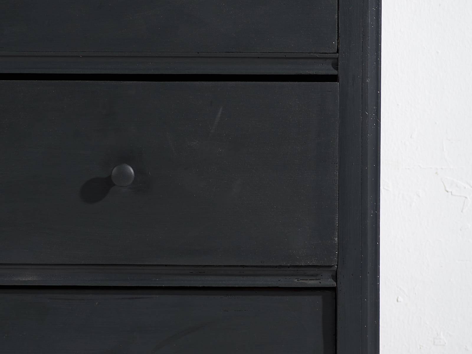 Antique chest of drawers in dark tones (c.1920)