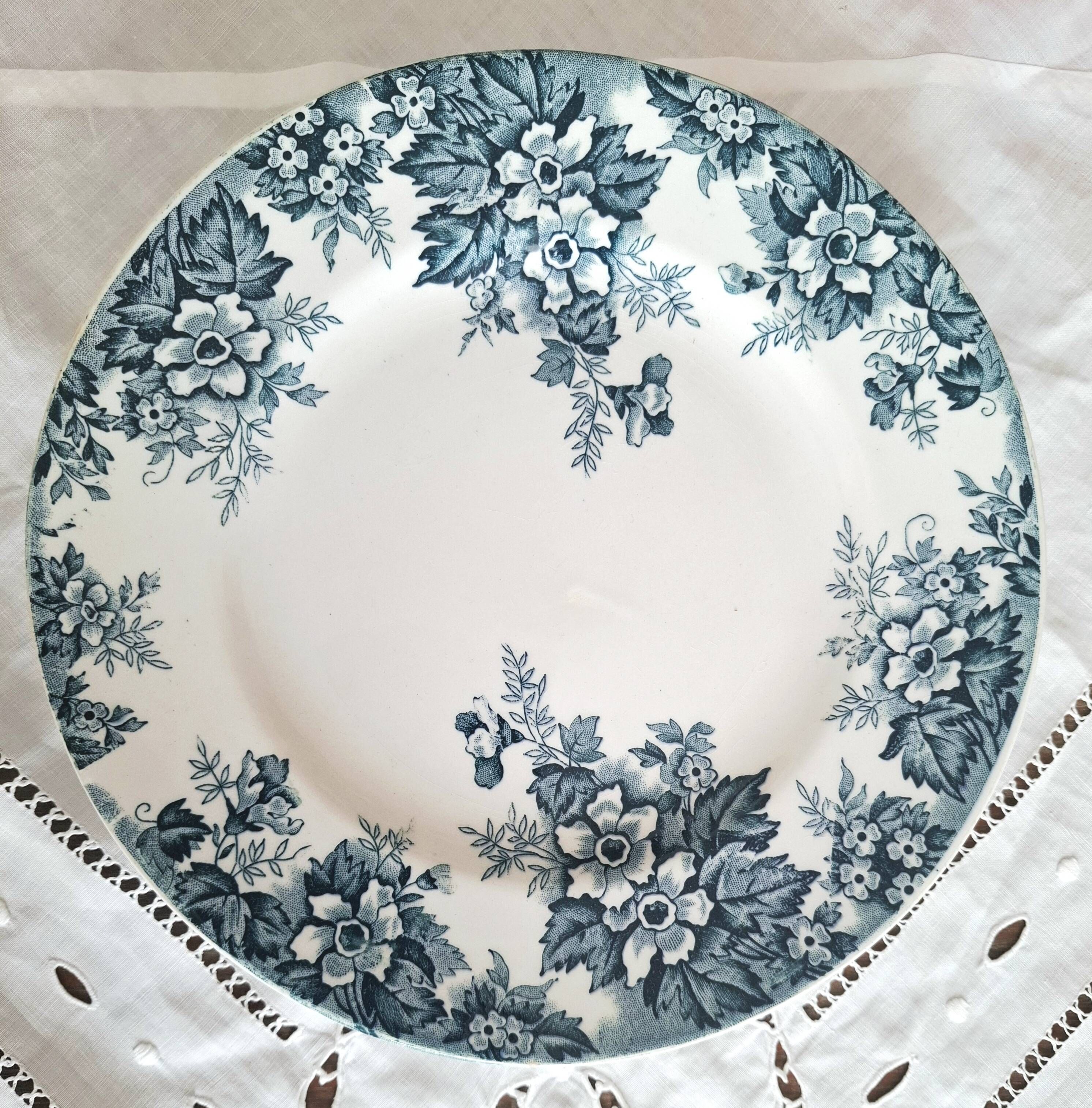 Assiette montée ancienne en faïence terre de fer