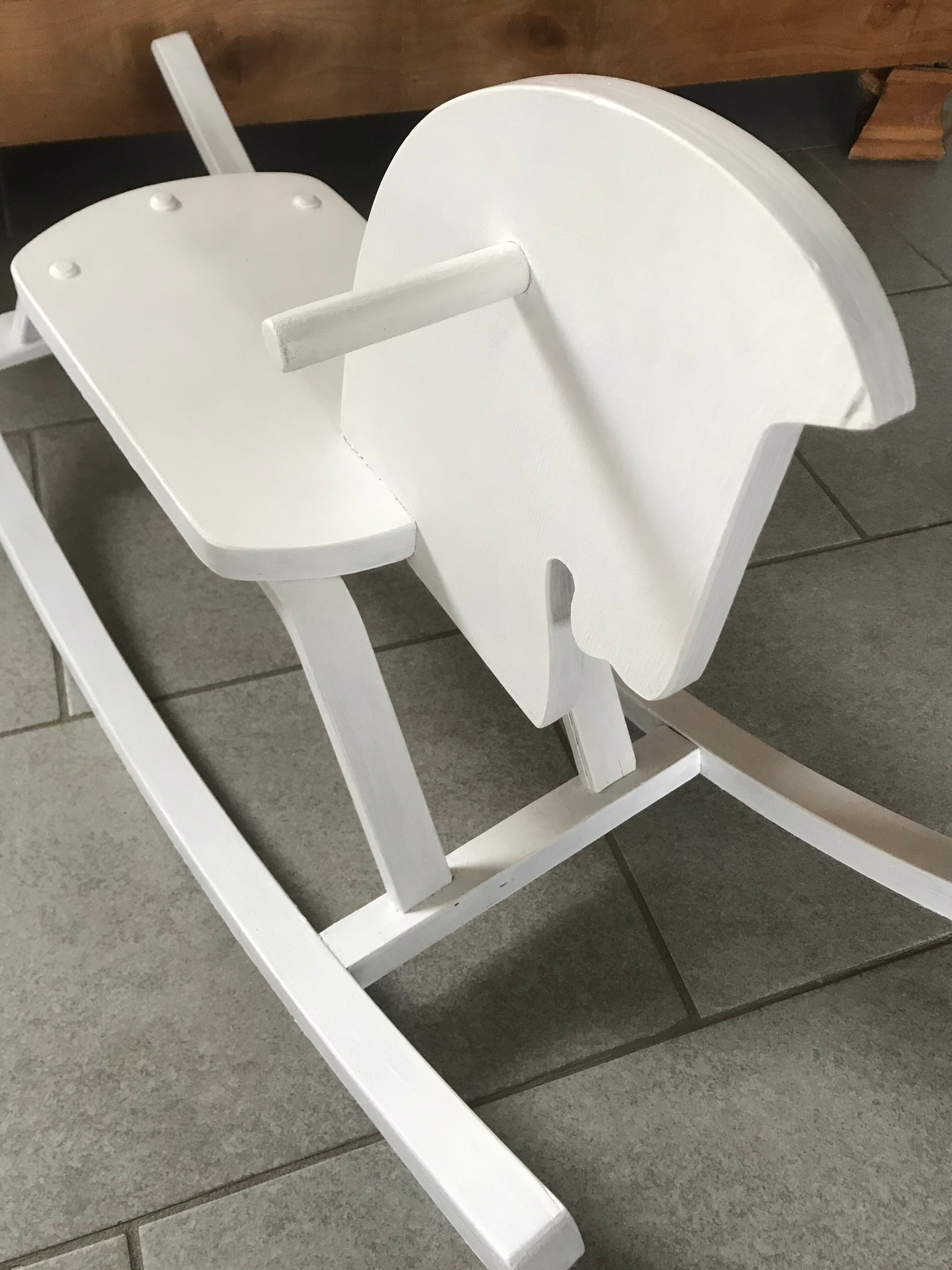 White wooden rocking horse