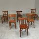Set of 6 mismatched blond wood bistro chairs