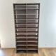 Large antique workshop cabinet with patinated wooden compartments, 20th century.