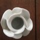 Two white porcelain flower candlesticks