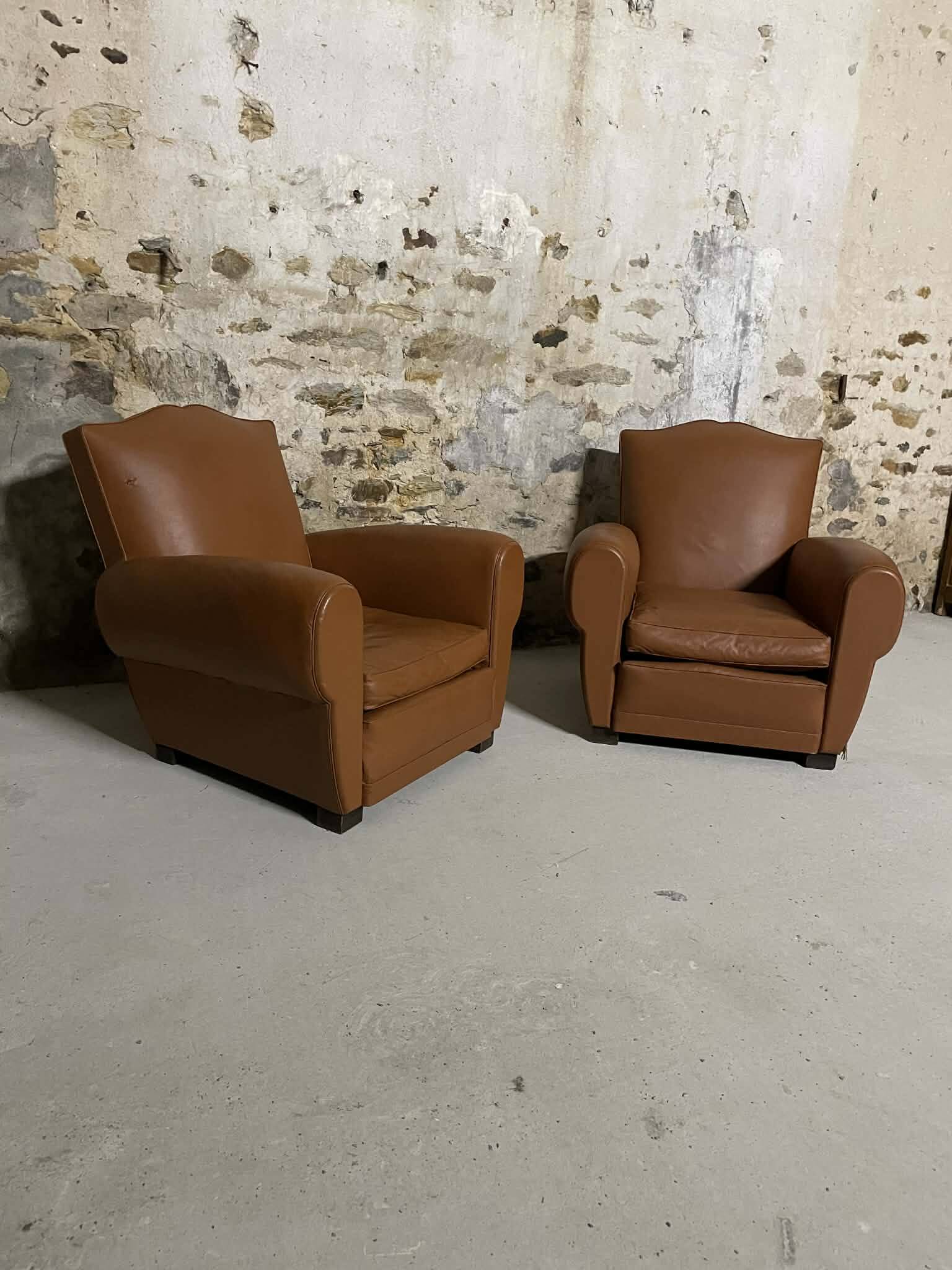 Pair of vintage club style armchairs in camel faux leather.
