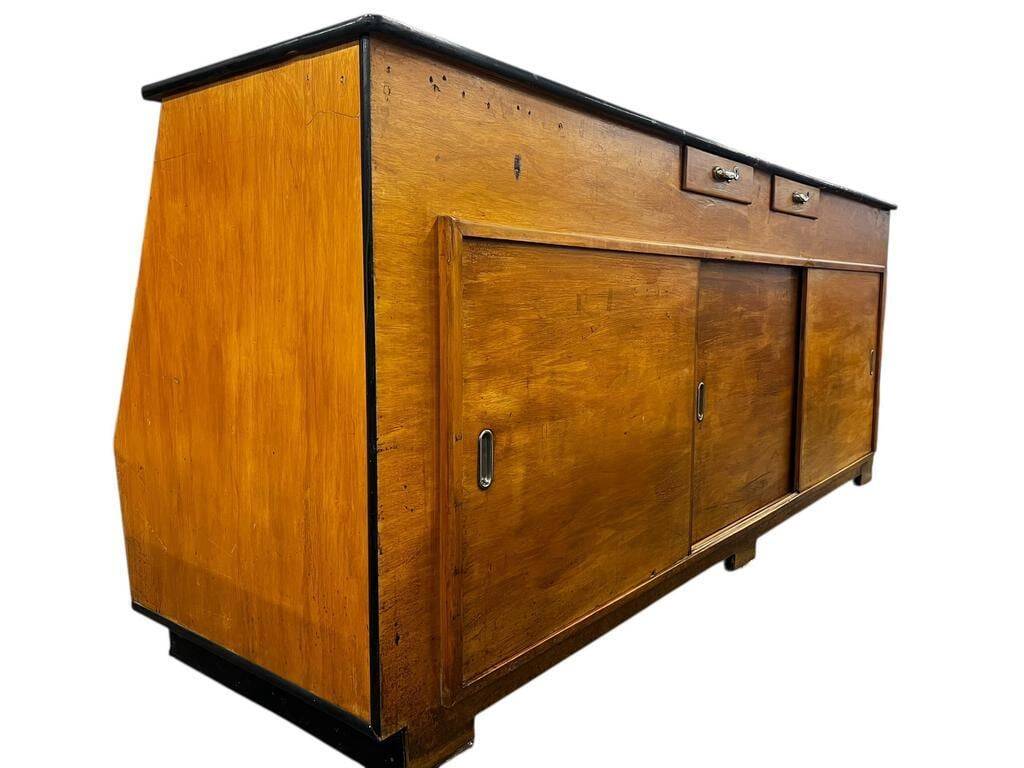 Vintage wooden shop counter with display case