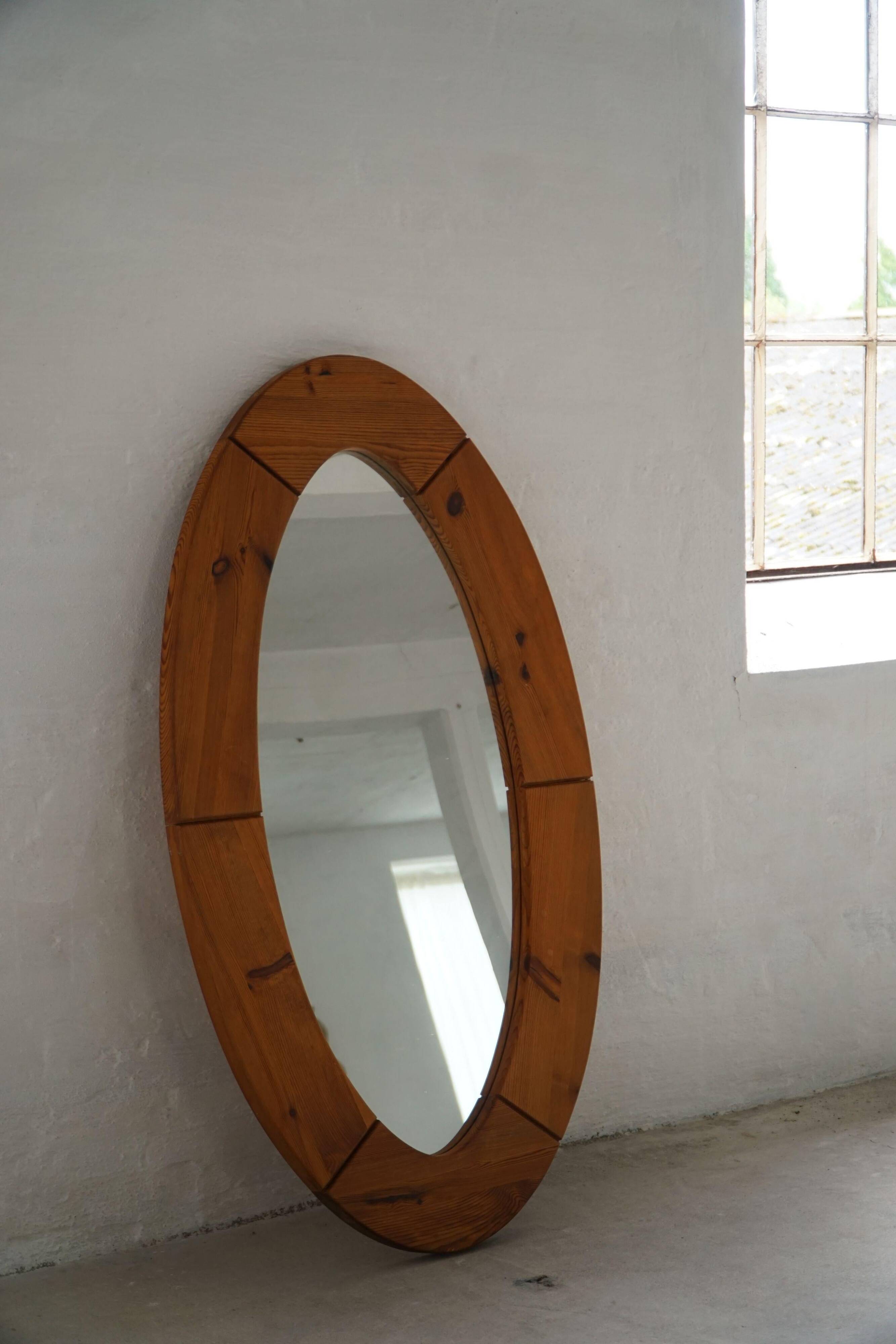 Large oval wall mirror in solid pine by Glasmäster Markaryd, Sweden, 1960s.