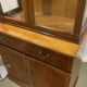 English display cabinet with two sections made of yew from the 1980s.