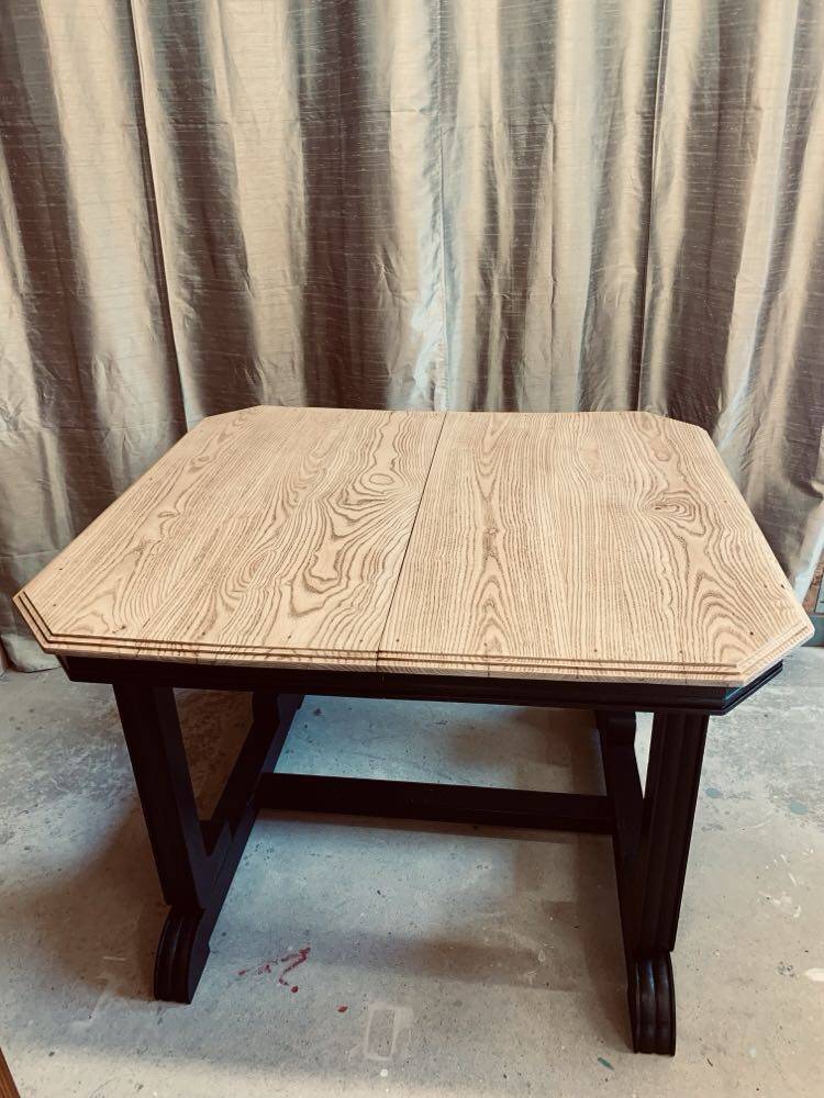 Art Deco dining table with raw wood top