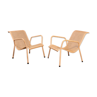 1960 perforated metal garden armchairs
