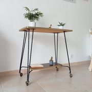Vintage Formica and wrought iron rolling dessert trolley/side table.