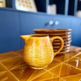 Braided ceramic pitcher