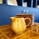 Braided ceramic pitcher