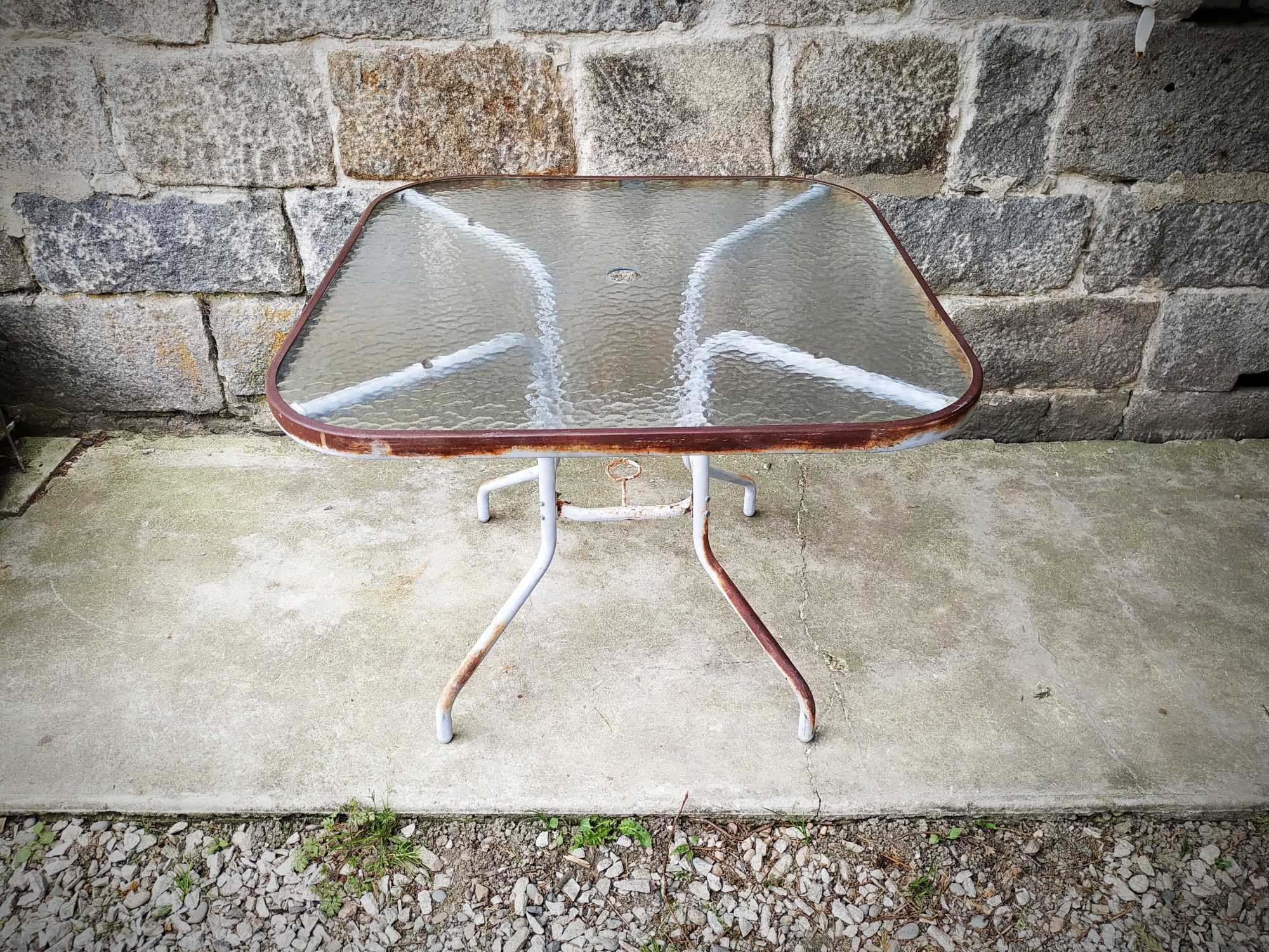 Old garden pedestal table