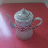 White enamelled sheet metal coffee maker with red and blue patterns