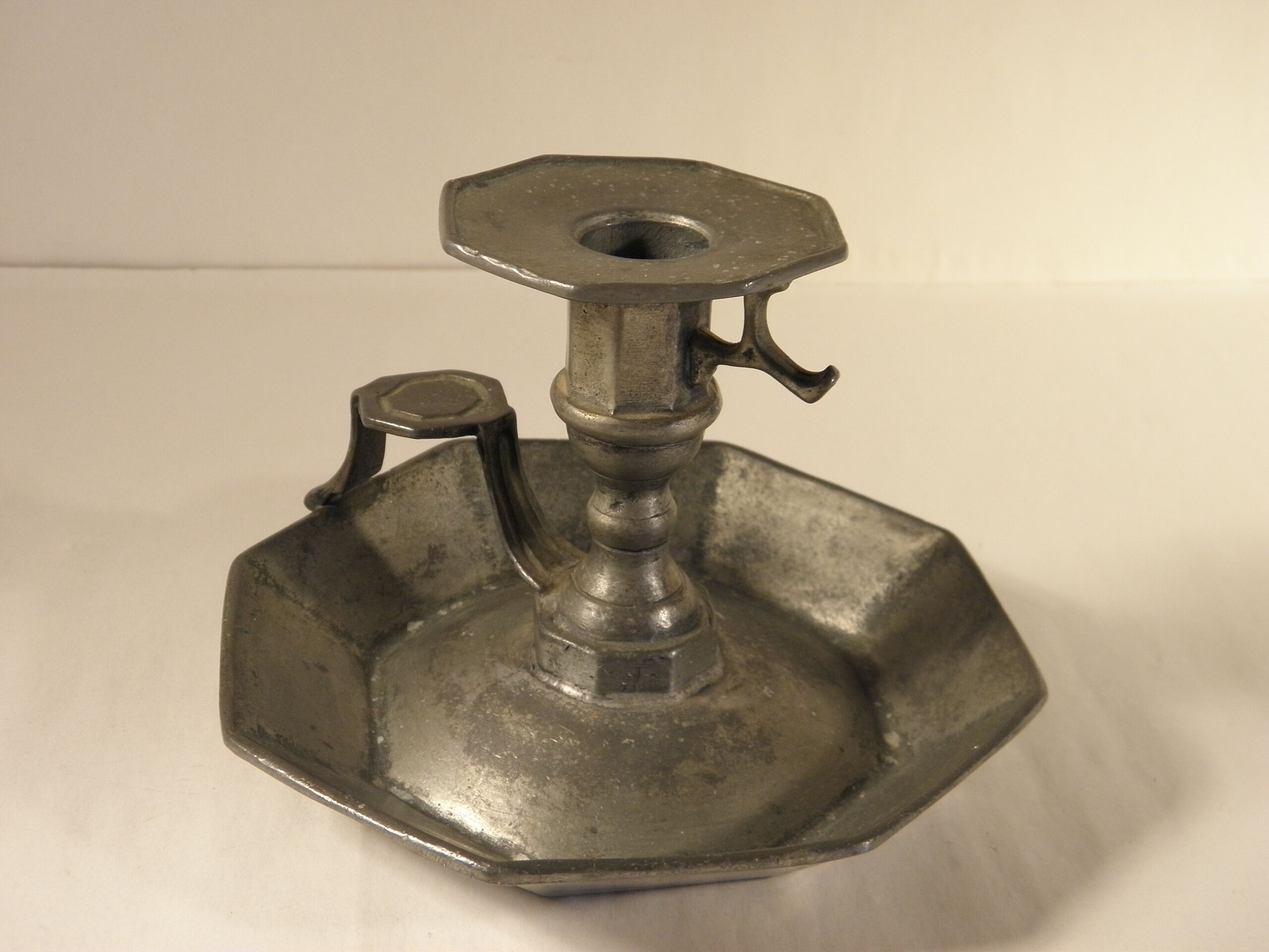 Tin candle holder