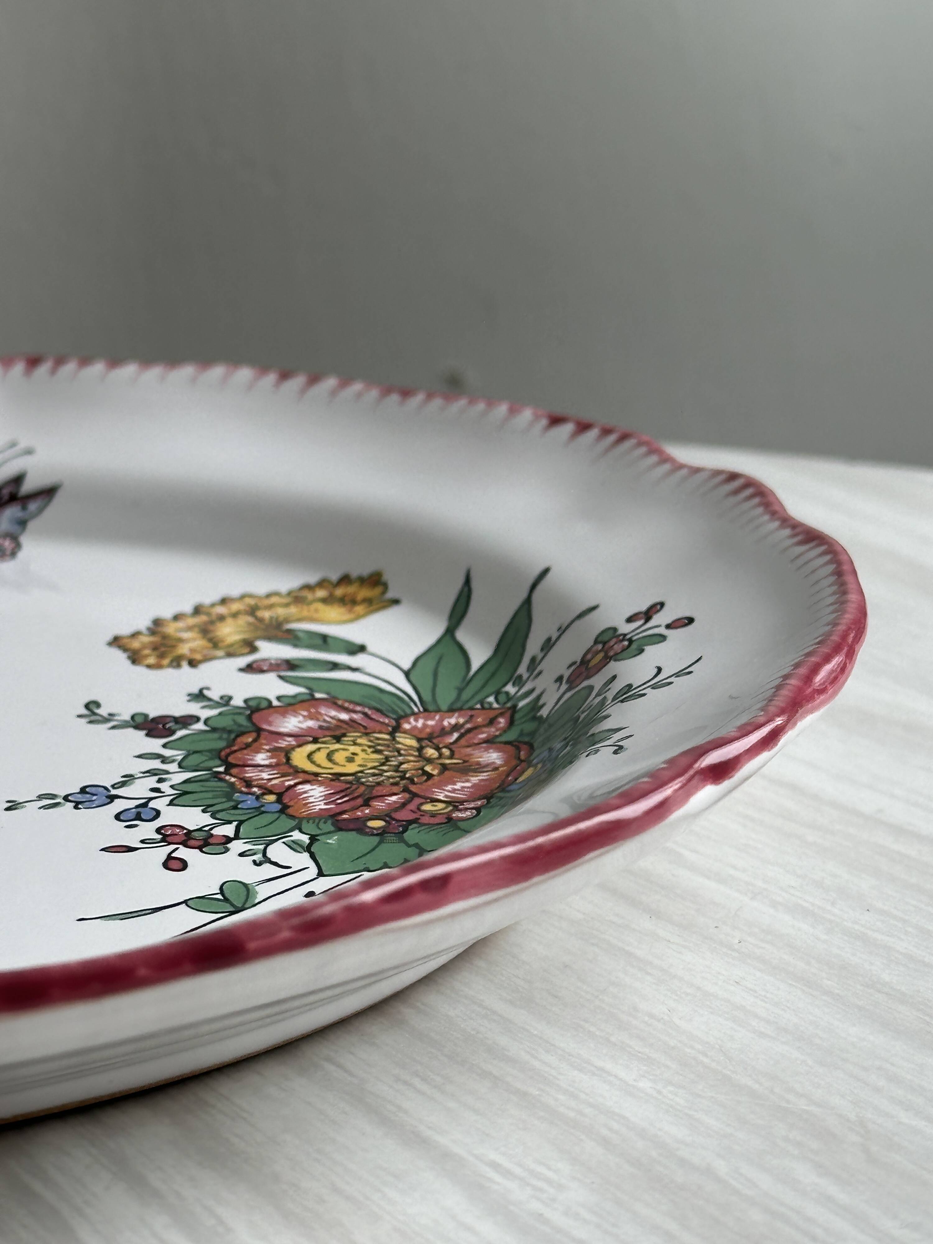 Decorative plate in Angoulême earthenware.